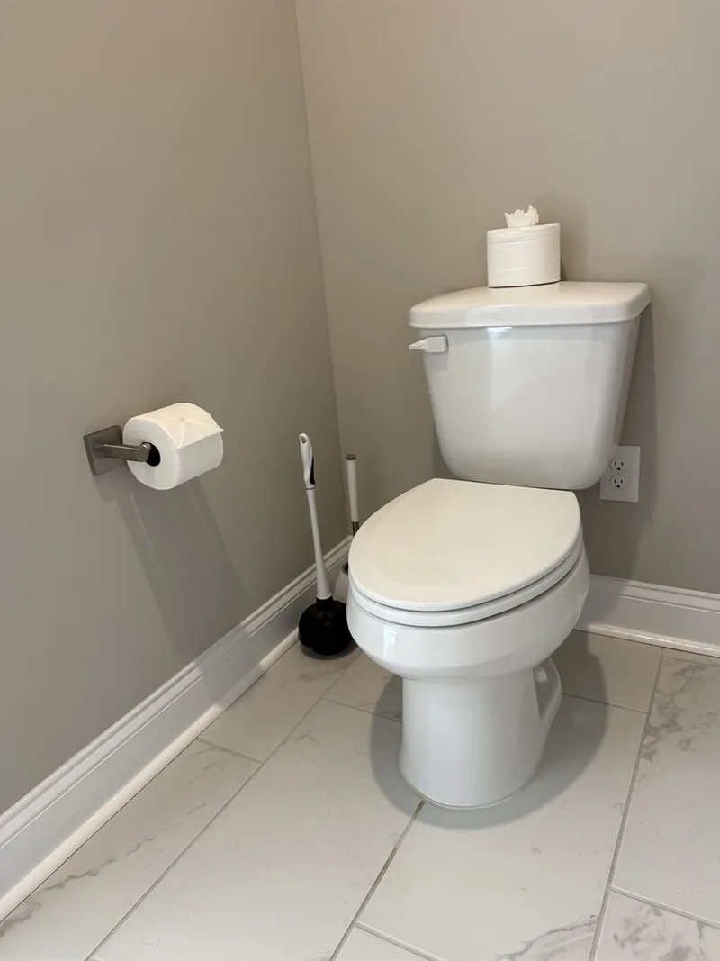 Precision fixture cleaning &mdash; sanitized toilet and detailed tile work
